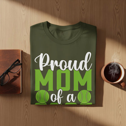 Green t-shirt with "Proud MOM of a" and tennis balls.