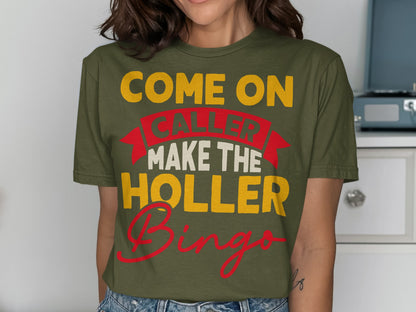 Green t-shirt with "Come On Caller Make the Holler Bingo" text in yellow and red.