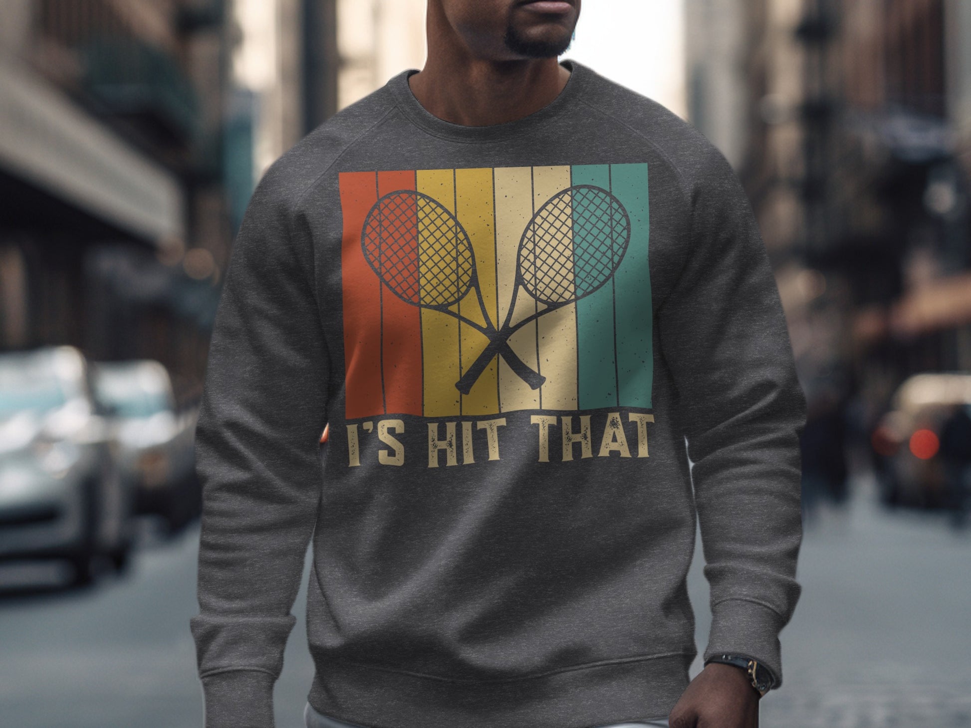Gray sweatshirt with crossed vintage tennis rackets and "IT'S HIT THAT" text.