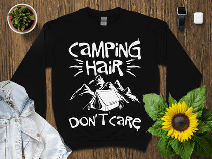 Black sweatshirt with "Camping Hair Don't Care" text and mountain graphic.