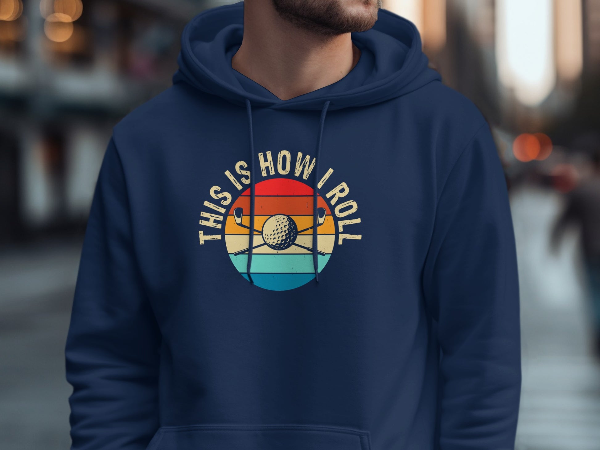 Navy hoodie with "This is How I Roll" and golf balls with clubs graphic.