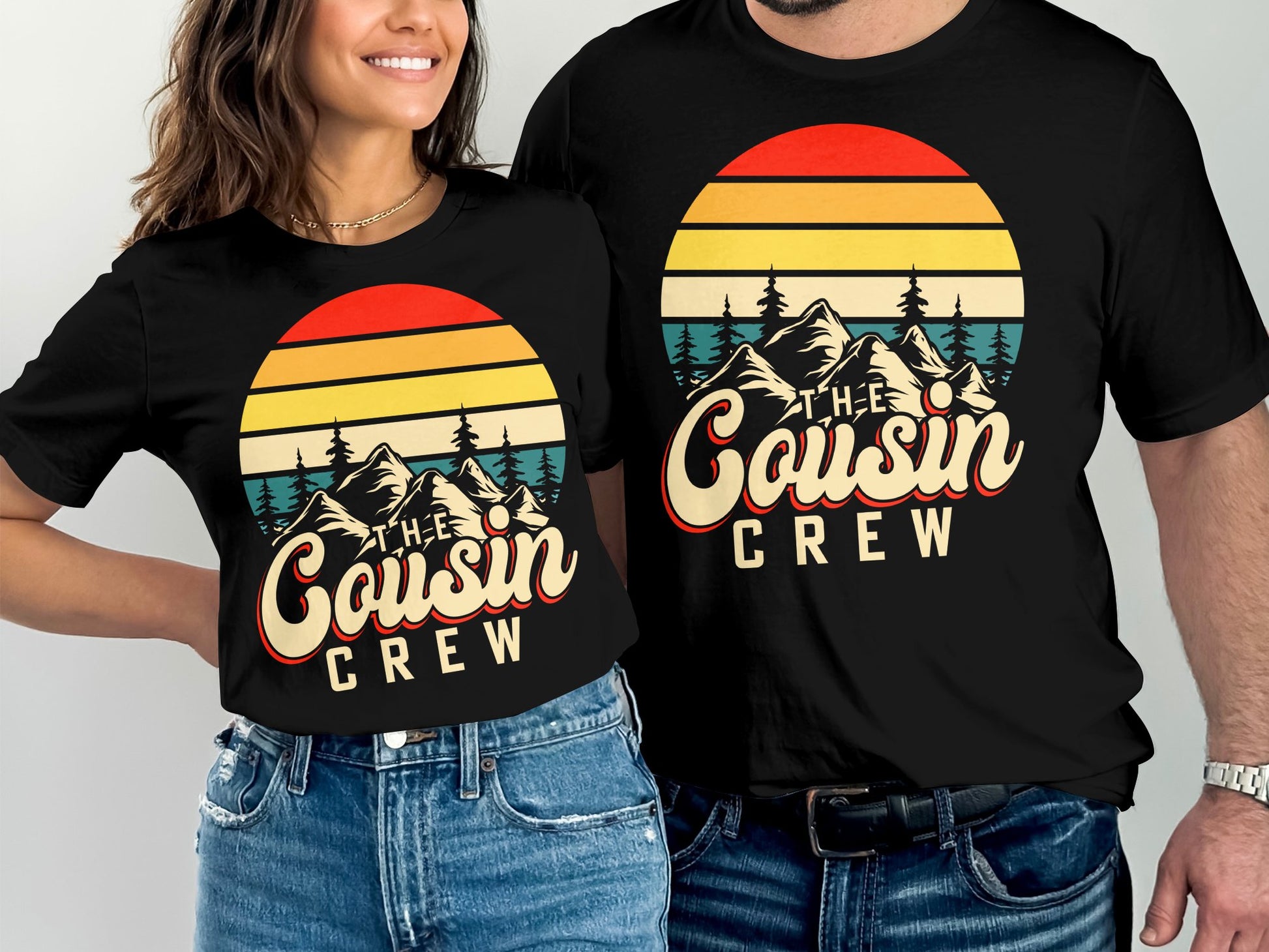 Black t-shirts with "The Cousin Crew" text and sunset mountain graphic.