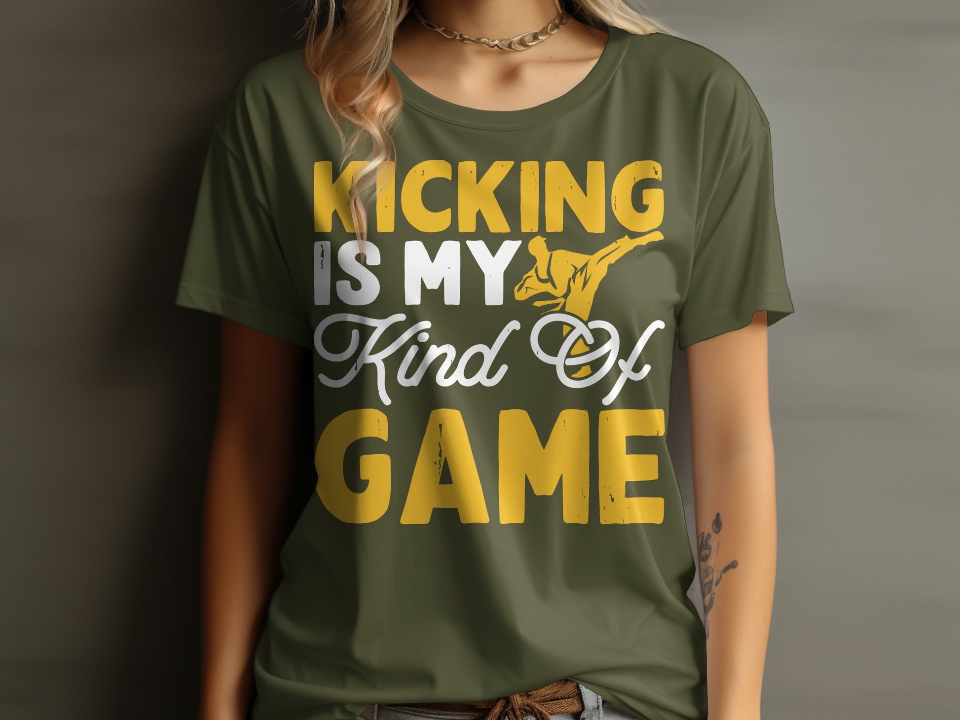 Green t-shirt with "Kicking is my kind of game" text and martial artist graphic.