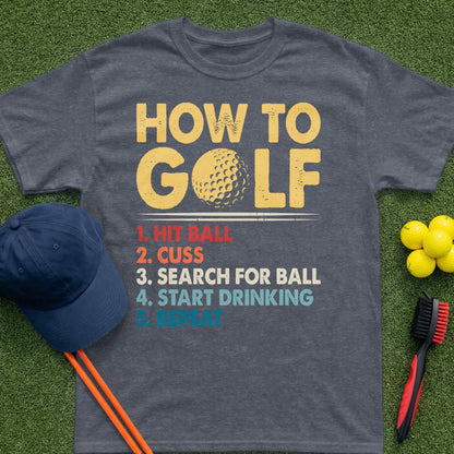 Dark grey t-shirt with "How To Golf" text and humorous steps.