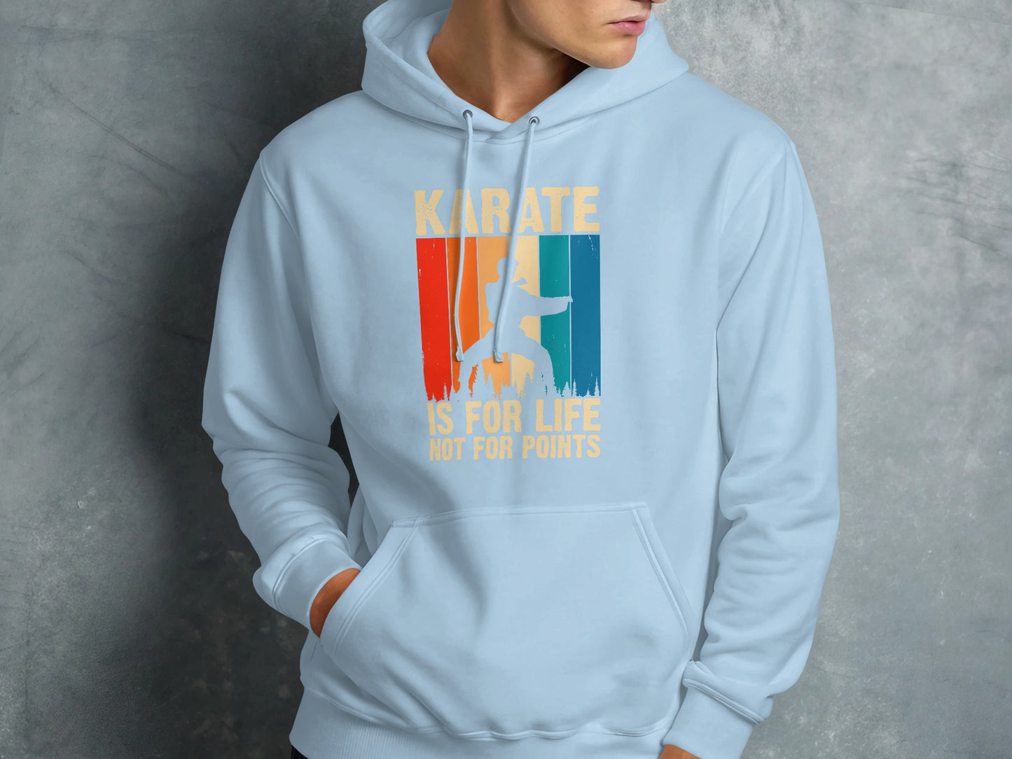 Light blue hoodie with "KARATE IS FOR LIFE" text and retro graphic.