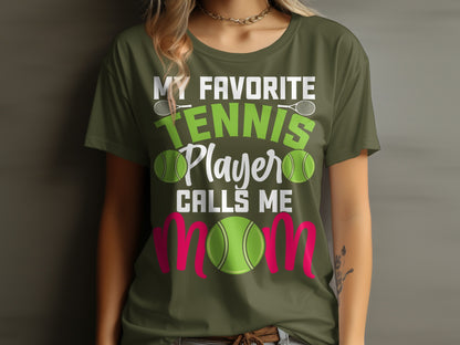 Green t-shirt with "My Favorite Tennis Player Calls Me Mom" text and tennis balls.
