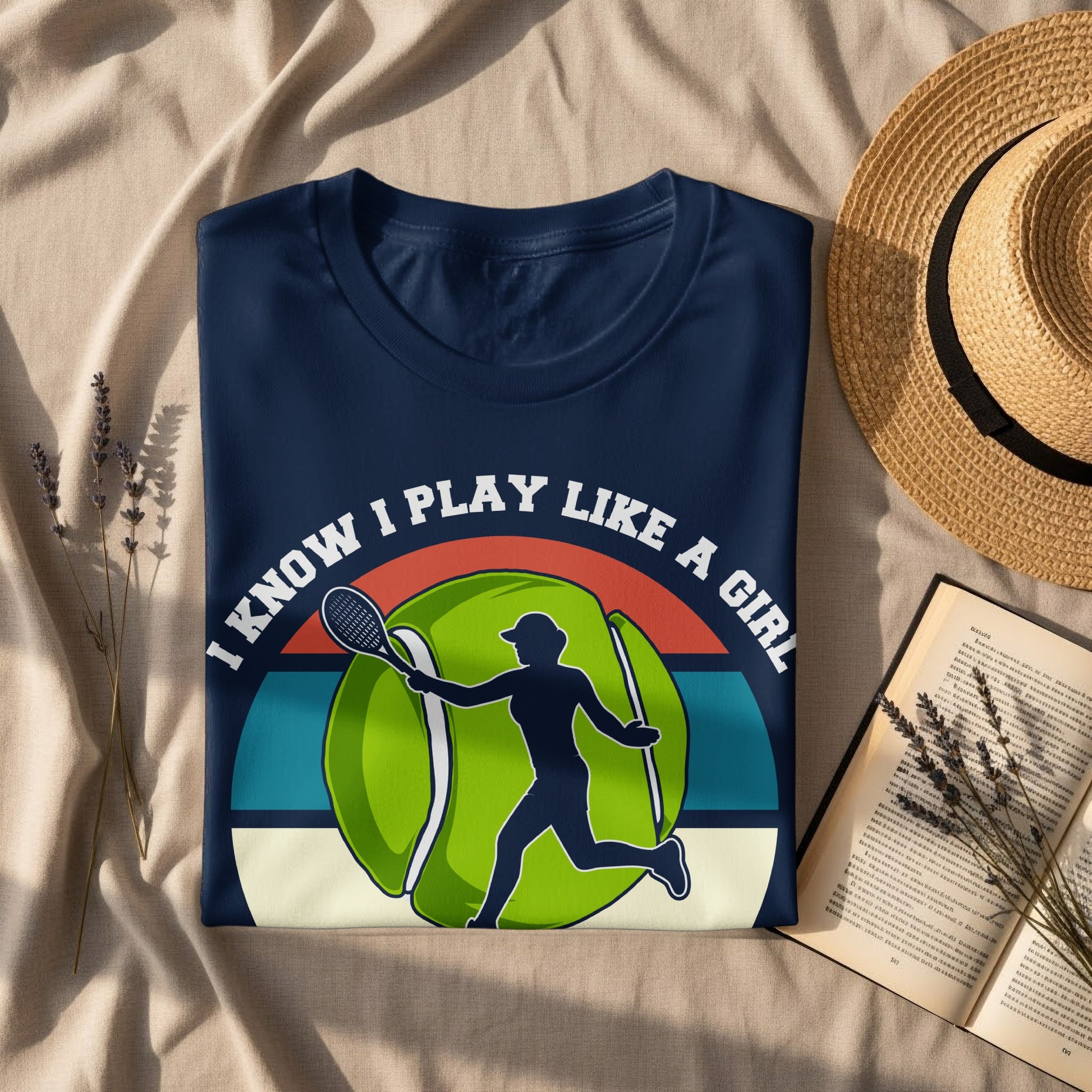 T-shirt with tennis player silhouette and text "I know I play like a girl".