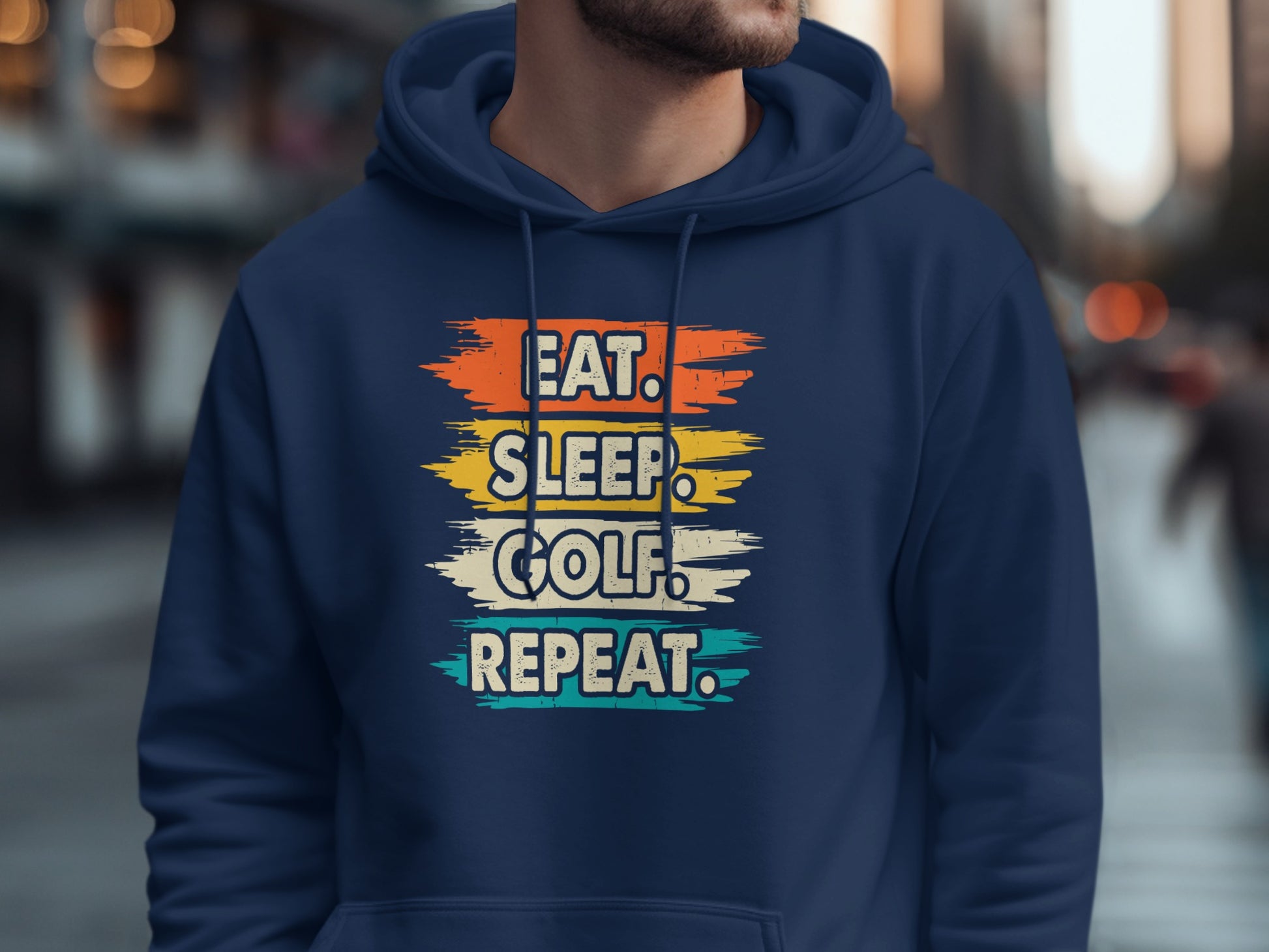 Navy hoodie with "Eat. Sleep. Golf. Repeat." text in colorful distressed stripes.