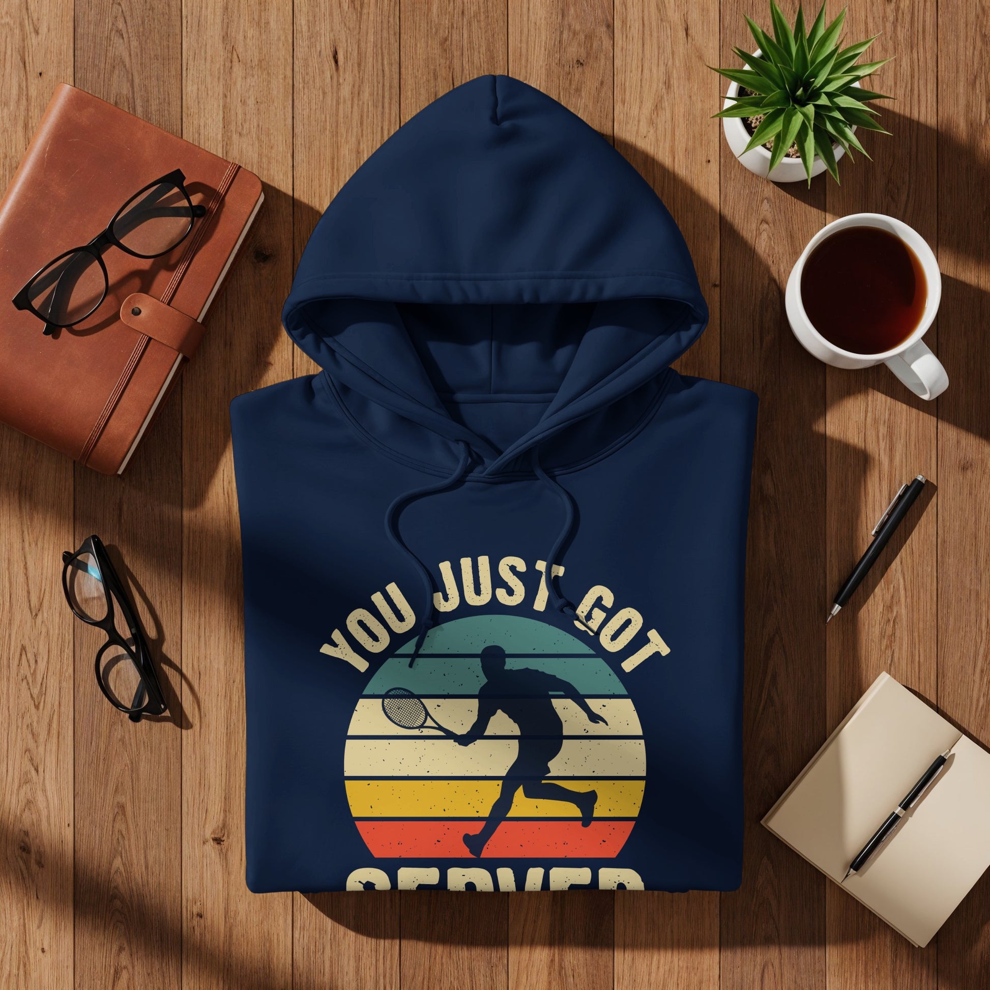 Navy hoodie with "You Just Got Served" text and a tennis player graphic.