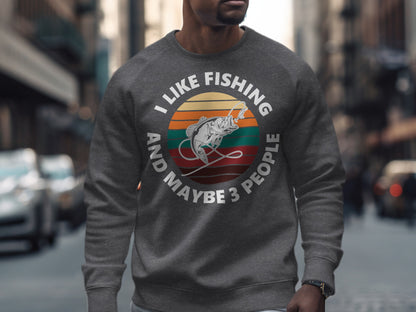 Crewneck sweatshirt with "I like fishing and maybe 3 people" text and fish graphic.