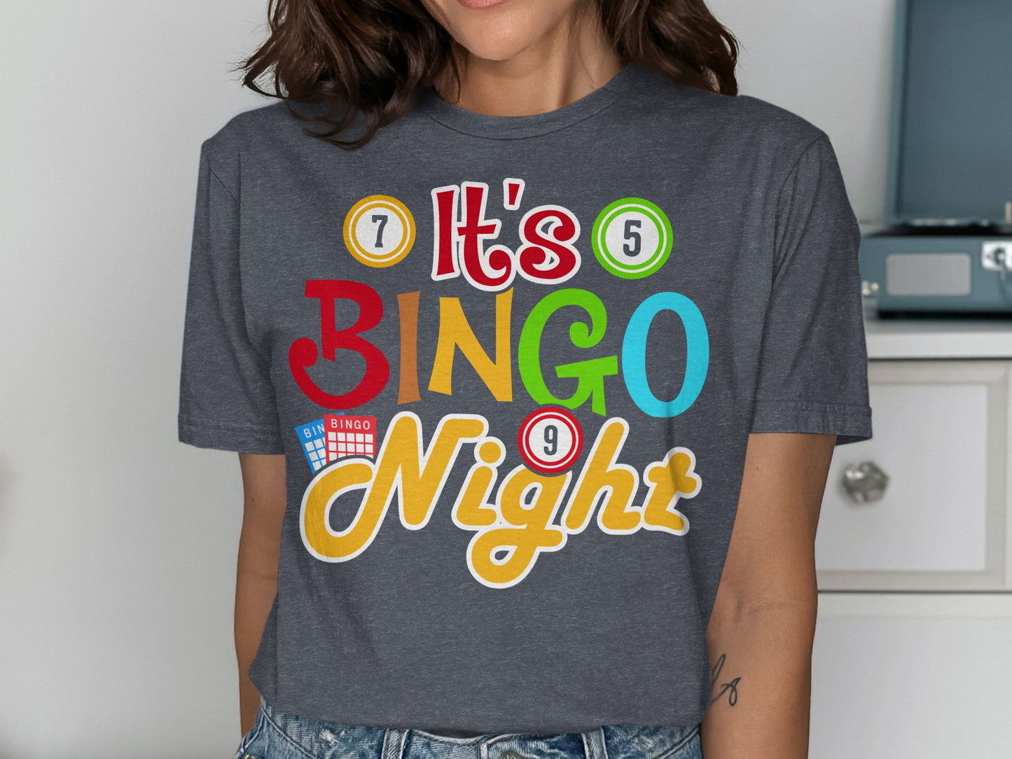 Dark grey t-shirt with "It's Bingo Night" in colorful letters and numbers.
