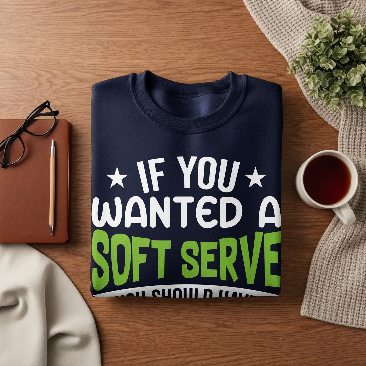 Navy sweatshirt with white text "IF YOU WANTED A SOFT SERVE" and green text "SHOULD HAVE".