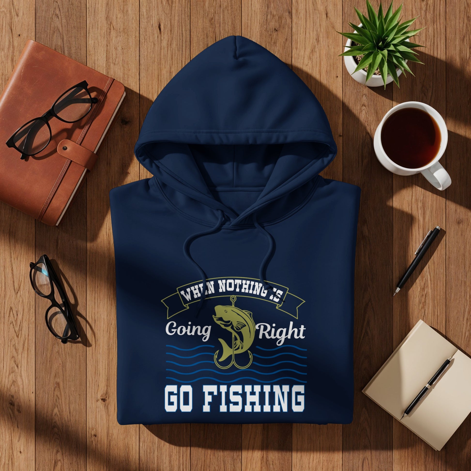 Navy blue hoodie with "When Nothing is Going Right, Go Fishing" text and fish graphic.