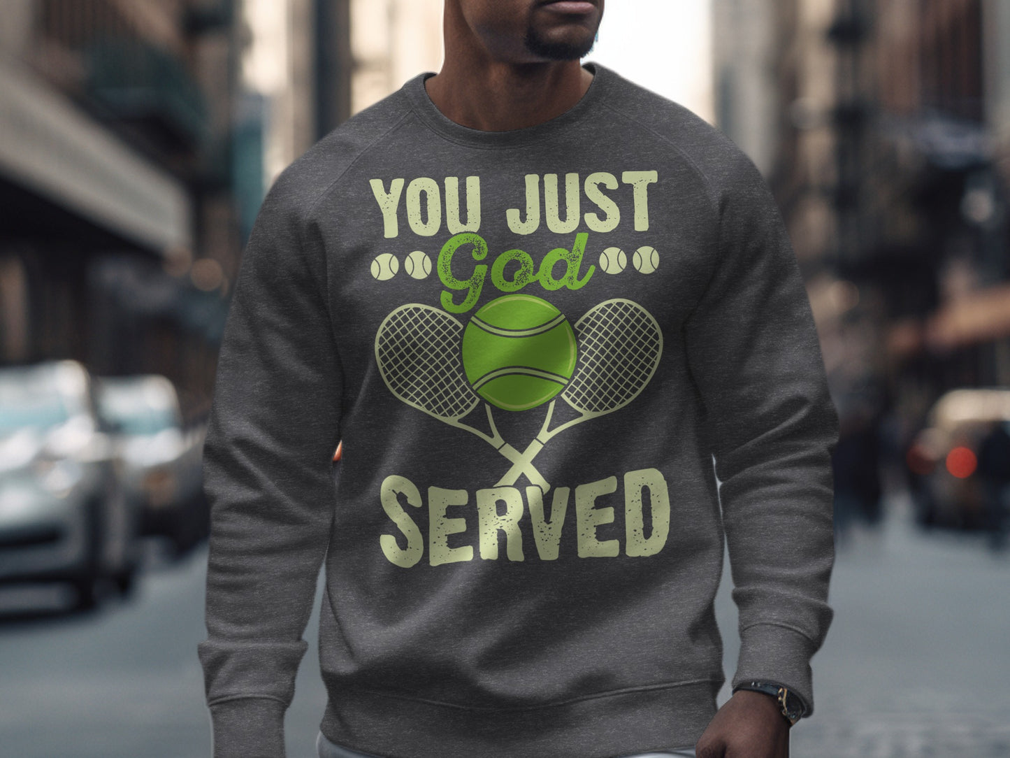 Grey sweatshirt with "YOU JUST GOD SERVED" text and tennis rackets.