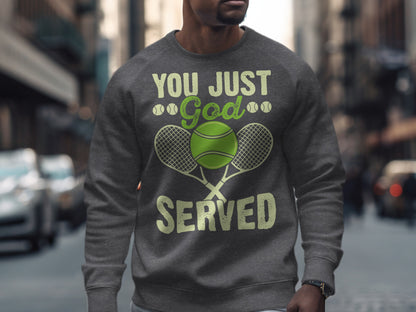 Grey sweatshirt with "YOU JUST GOD SERVED" text and tennis rackets.