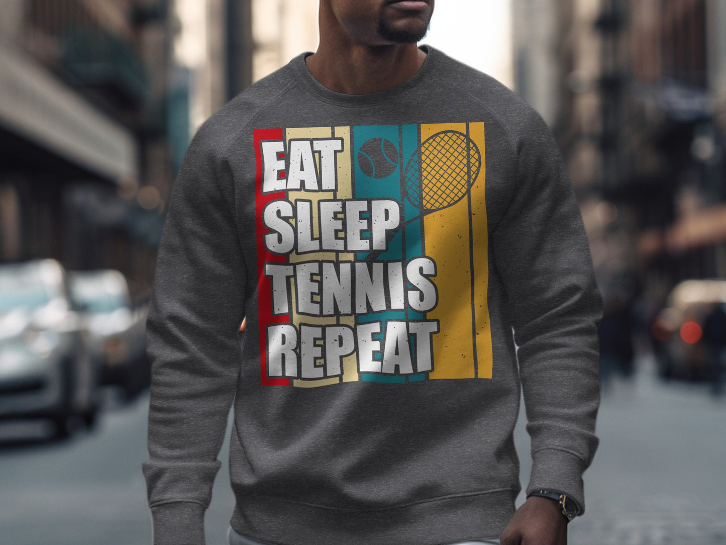 Gray sweatshirt with "Eat Sleep Tennis Repeat" text and a tennis racket graphic.