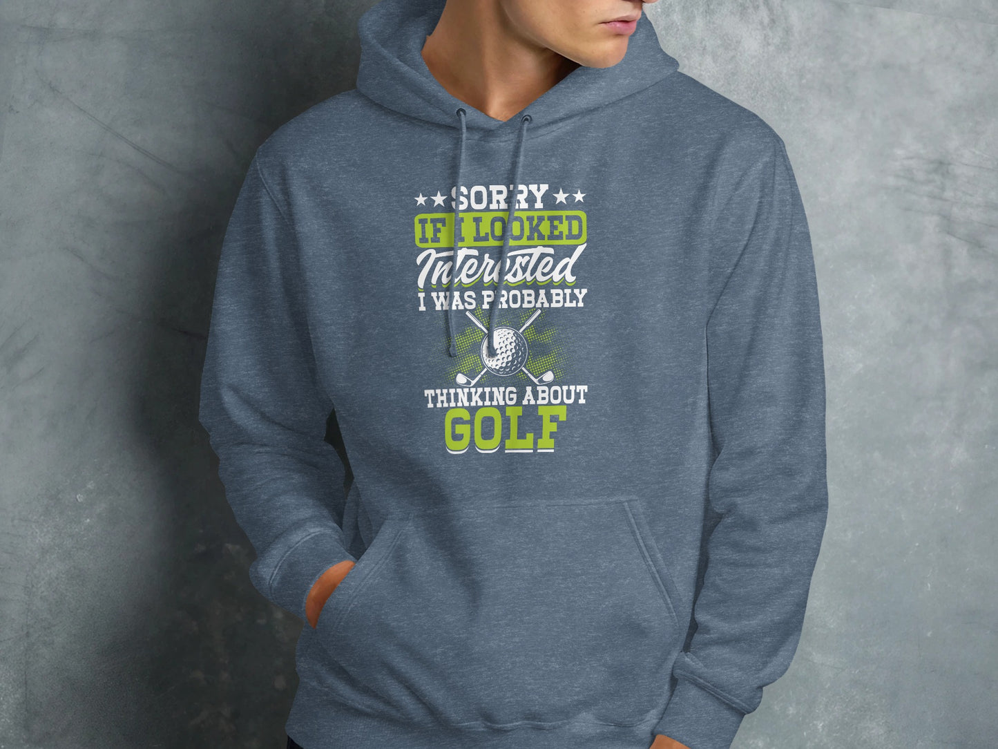 Gray hoodie with "Sorry if I looked interested I was probably thinking about golf" text.