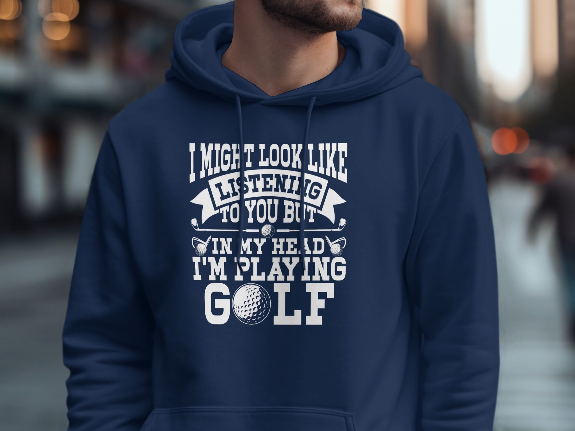 Navy hoodie with "I might look like I'm listening but in my head I'm playing golf."