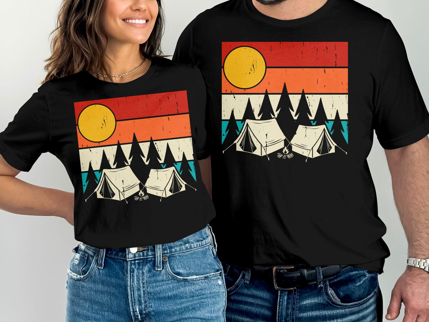 Matching couple's t-shirts with a sunset camping scene.