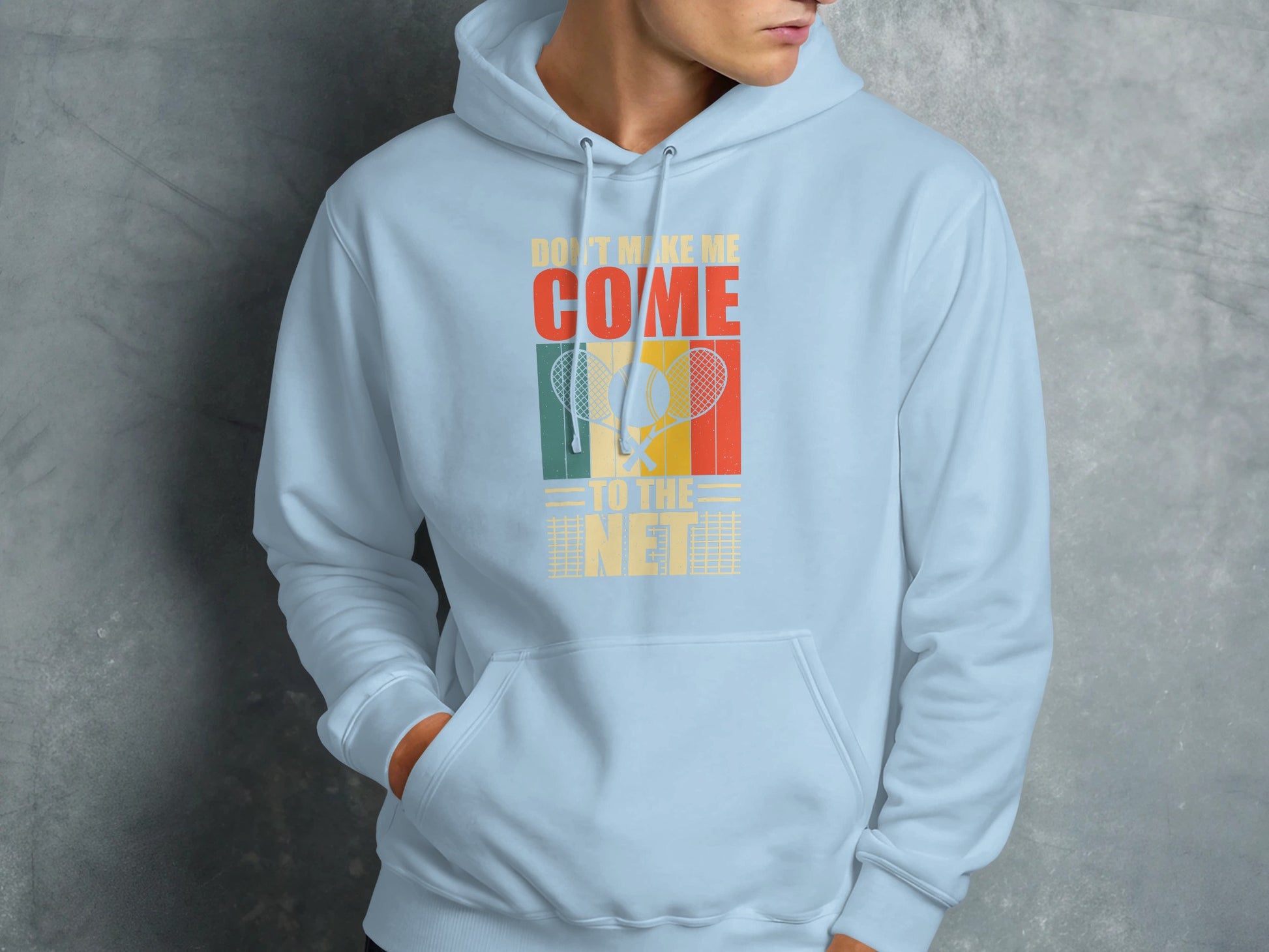 Light blue hoodie with "Don't Make Me Come to the Net" text and tennis rackets.