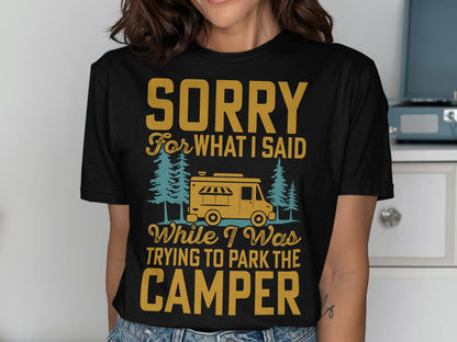 Black t-shirt with yellow text reading "Sorry for what I said while I was trying to park the camper" and a camper illustration.