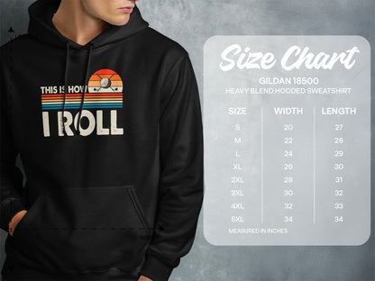 Hoodie with "I ROLL" and golf graphic, next to a size chart.