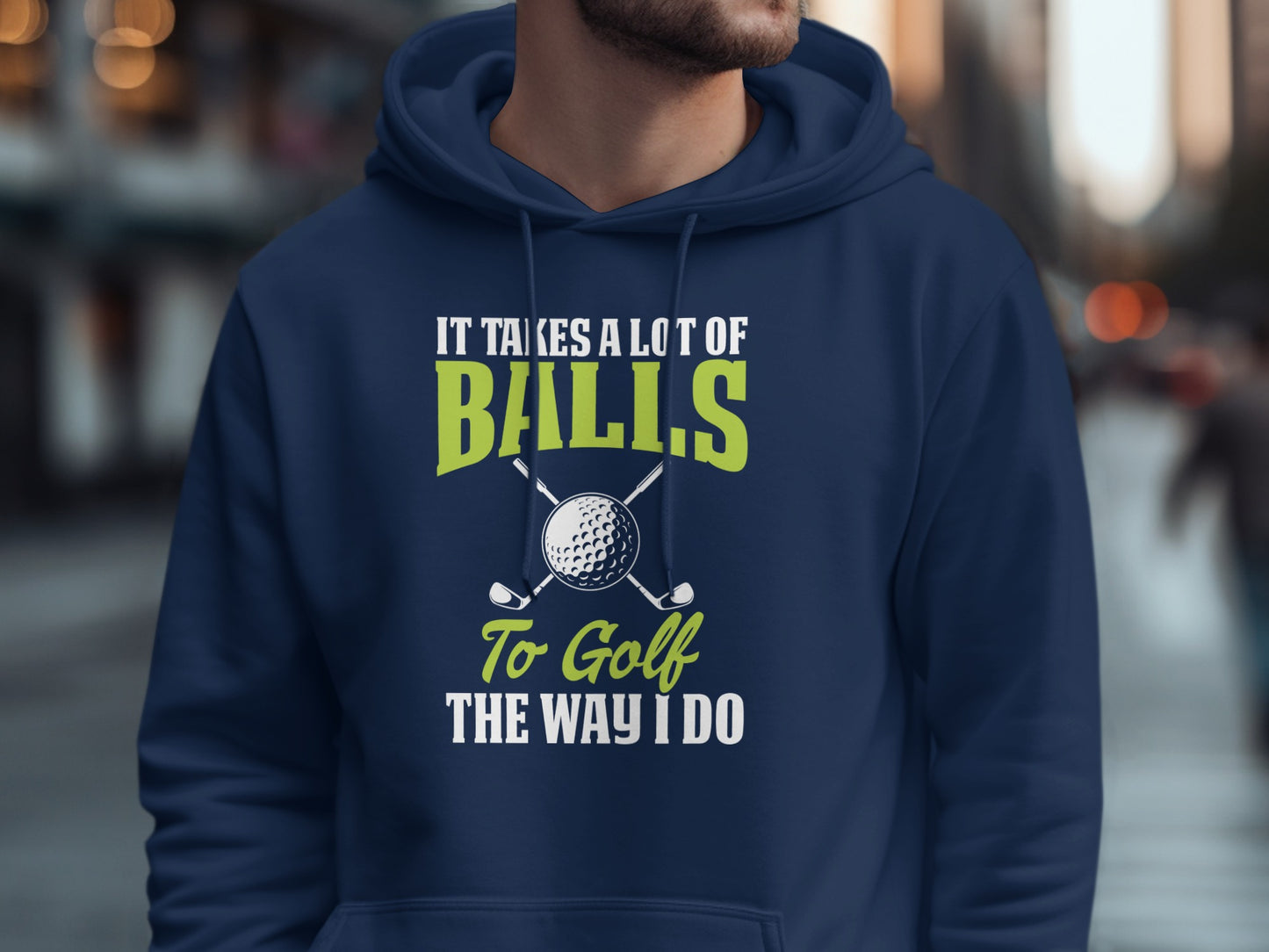 Navy hoodie with "It Takes a Lot of Balls to Golf the Way I Do" text and golf club graphic.