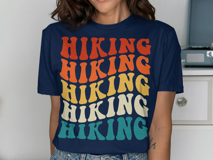 Navy t-shirt with "Hiking" in colorful, retro text.
