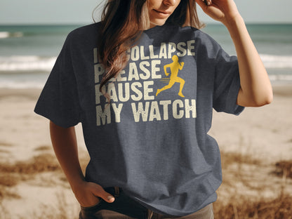Dark t-shirt with text "I COLLAPSE PLEASE PAUSE MY WATCH" and running silhouette.
