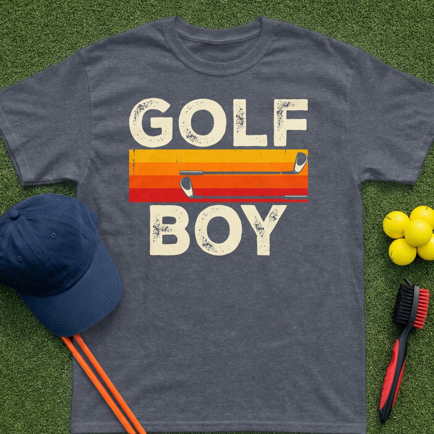 Charcoal t-shirt with "GOLF BOY" in distressed text and a retro sunset graphic.