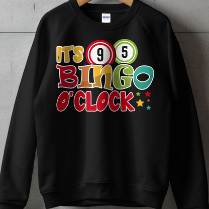 Black sweatshirt with "IT'S BINGO O'CLOCK" text and bingo balls.
