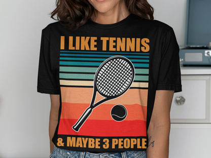 Black t-shirt with "I LIKE TENNIS & MAYBE 3 PEOPLE" and tennis racket graphic.