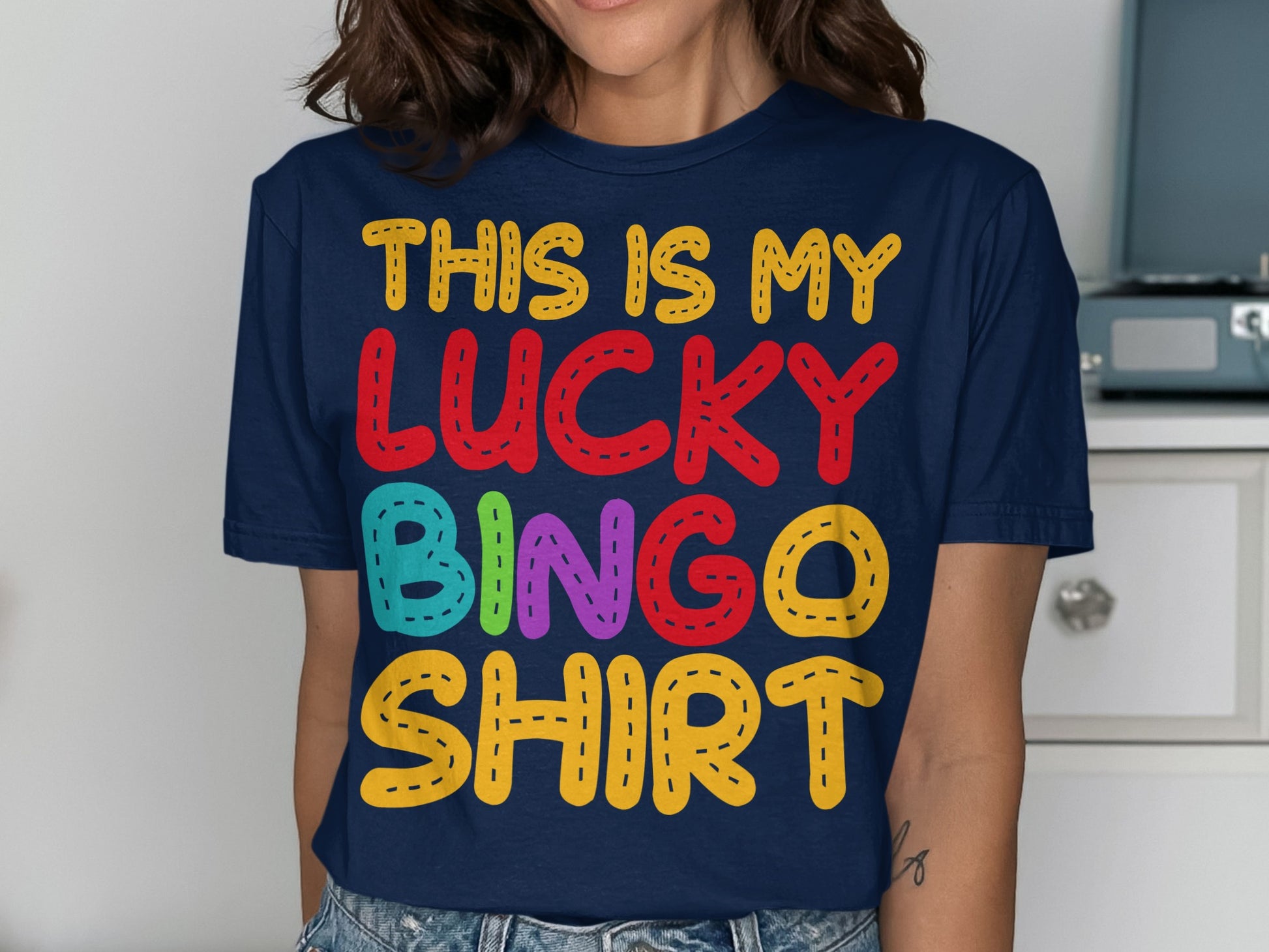 Navy t-shirt with "THIS IS MY LUCKY BINGO SHIRT" in colorful, playful text.