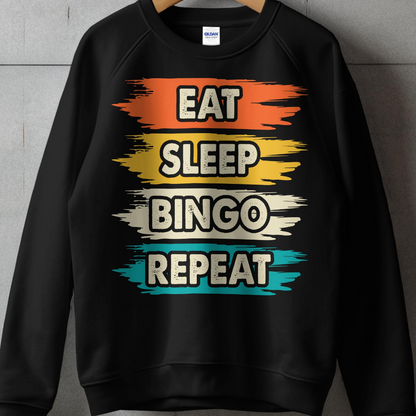 Black sweatshirt with "Eat Bingo Repeat" text in colorful stripes.
