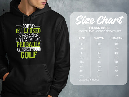 Hooded sweatshirt with "Sorry if I looked interested I was probably thinking about golf" text and size chart.
