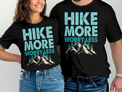 Couple wearing matching "Hike More Worry Less" t-shirts with mountain graphic.