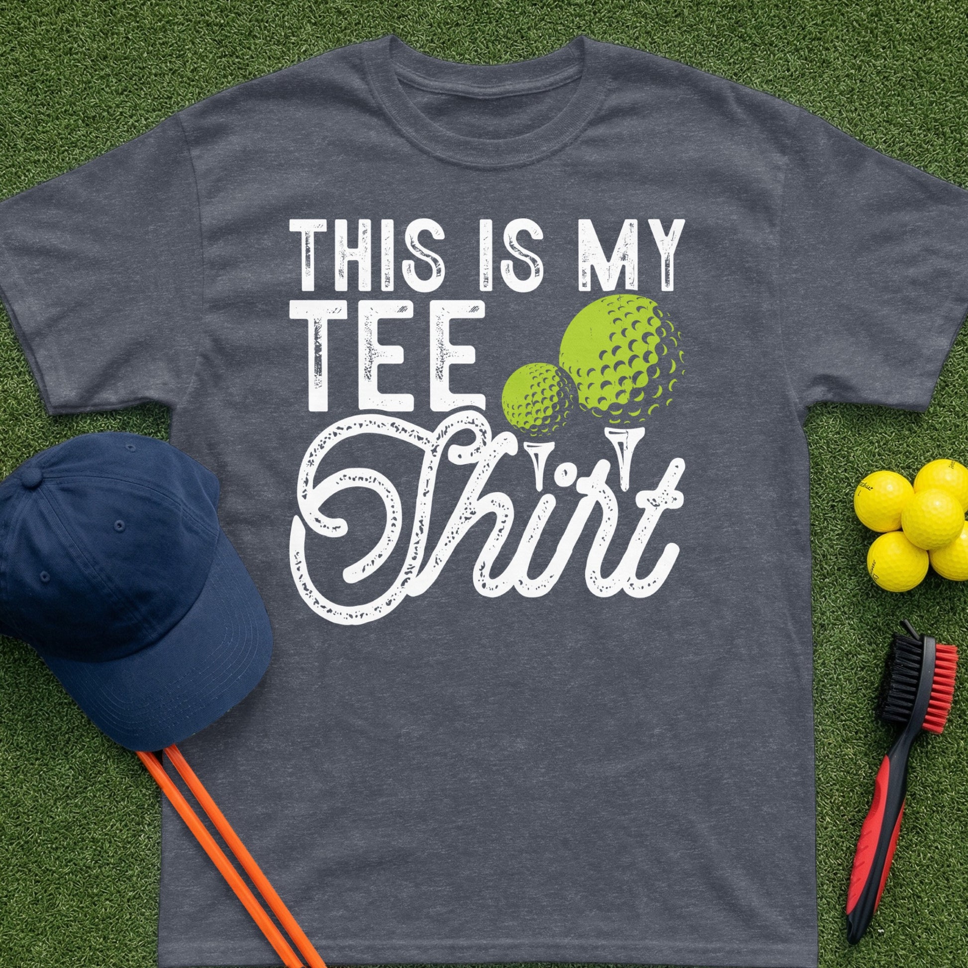 Dark t-shirt with "This Is My Tee Shirt" text and golf ball graphic.