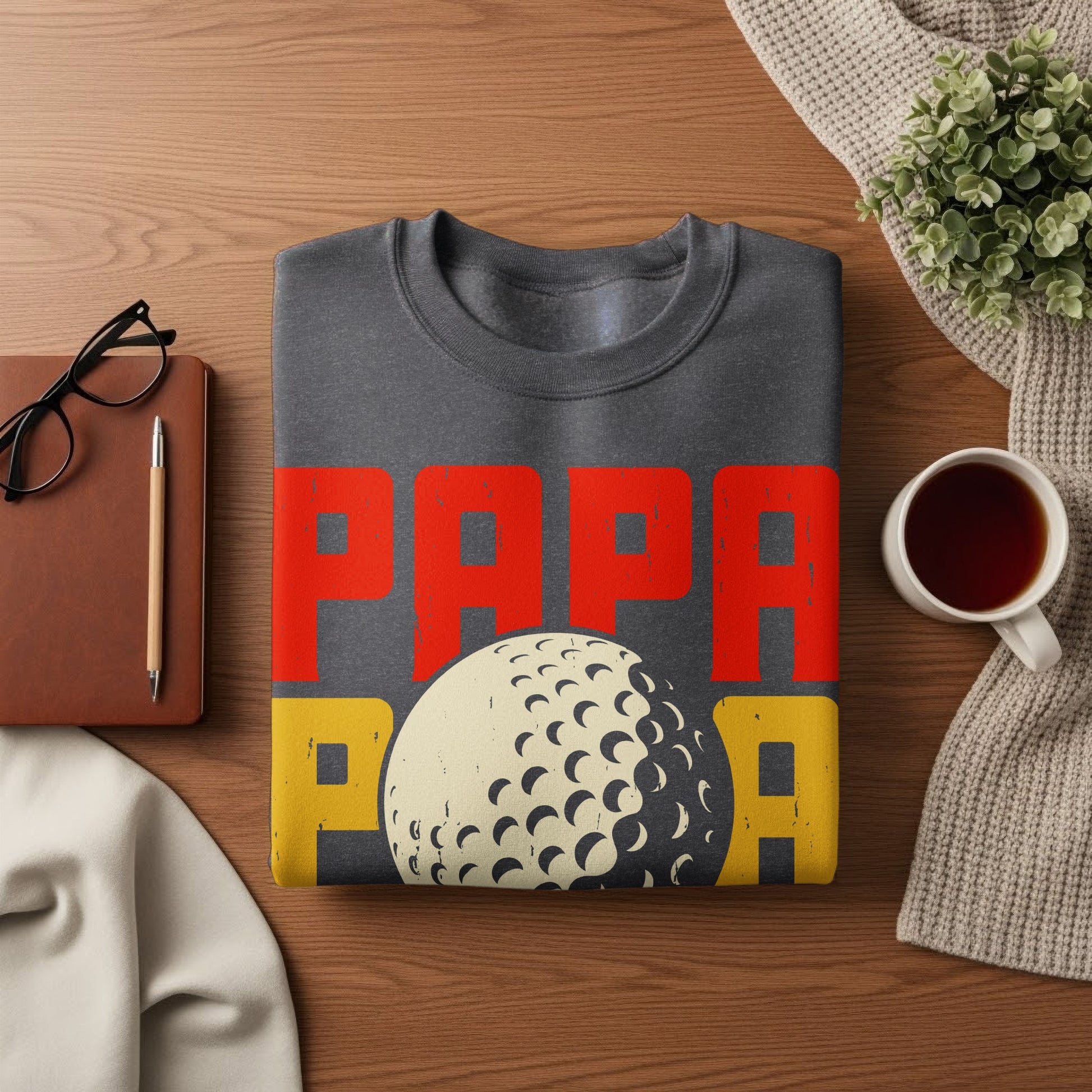 Dark gray sweatshirt with "PAPA GOLF" text and golf ball graphic.