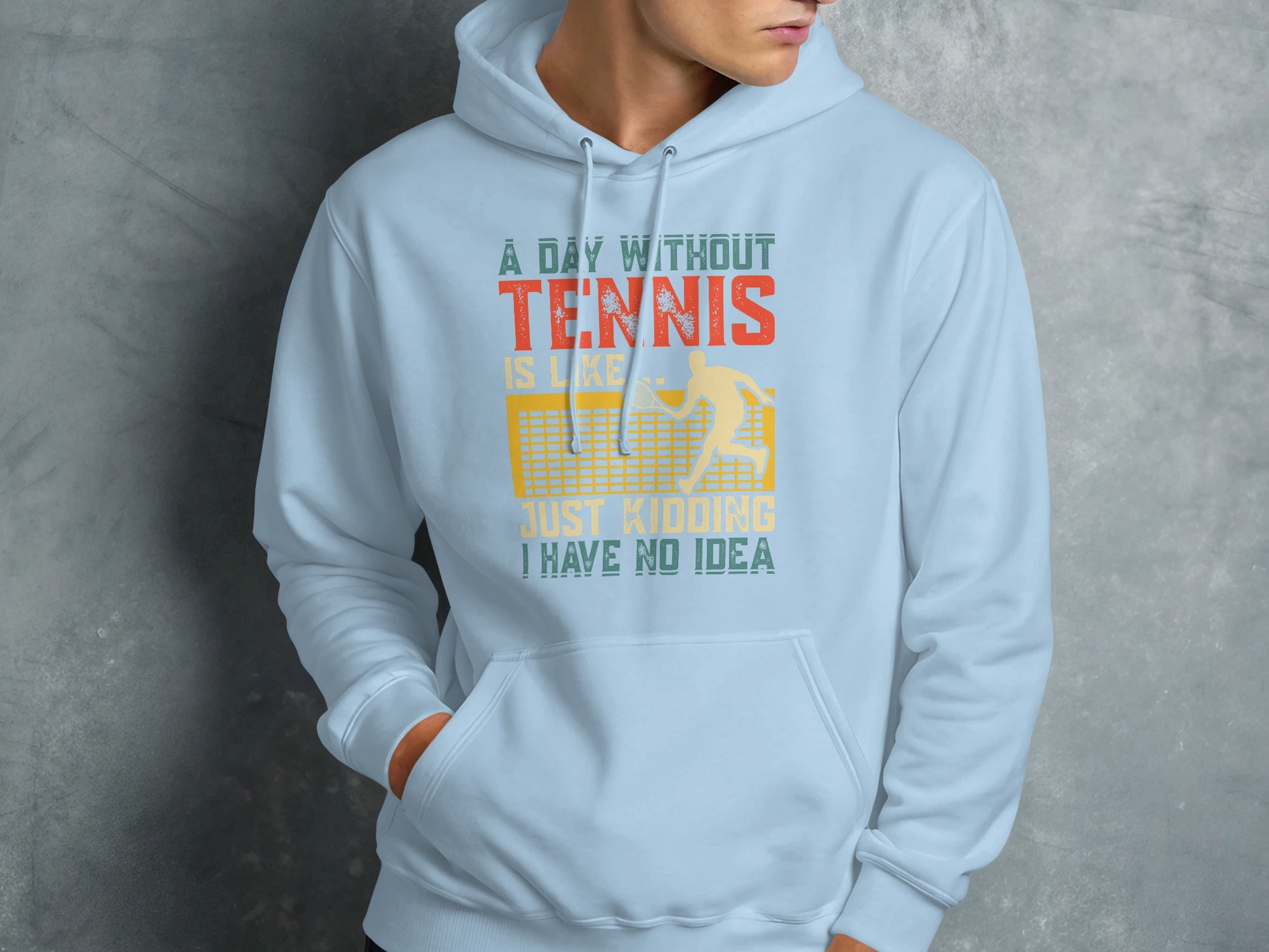 Light blue hoodie with "A day without TENNIS is like..." text and tennis player graphic.