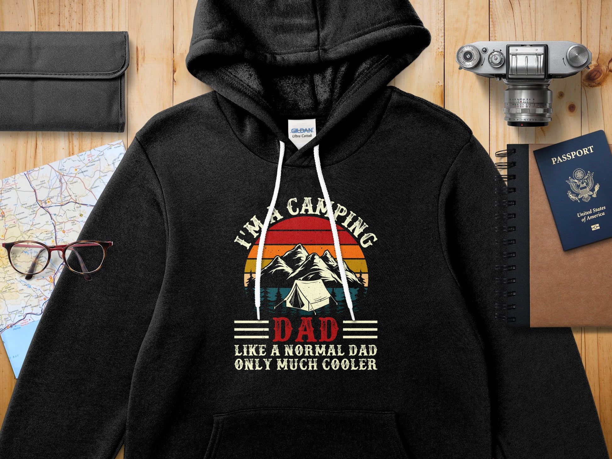 Black hoodie with "I'm a camping dad, only much cooler" slogan.