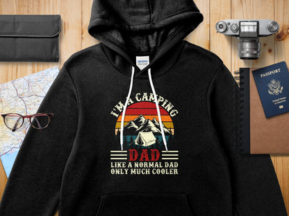 Black hoodie with "I'm a camping dad, only much cooler" slogan.