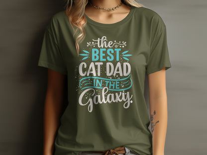Green t-shirt with "The Best Cat Dad in the Galaxy" text.