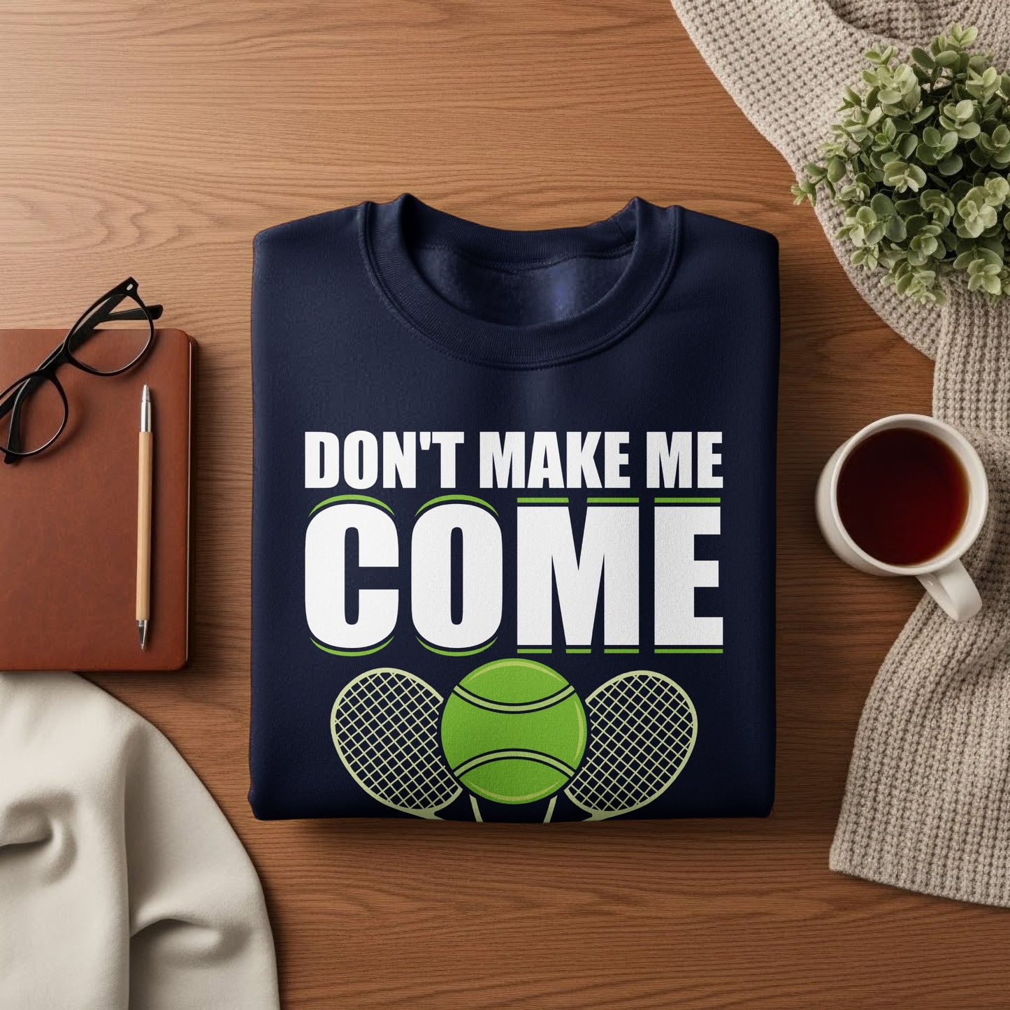 Navy sweatshirt with "DON'T MAKE ME COME" and tennis graphic.