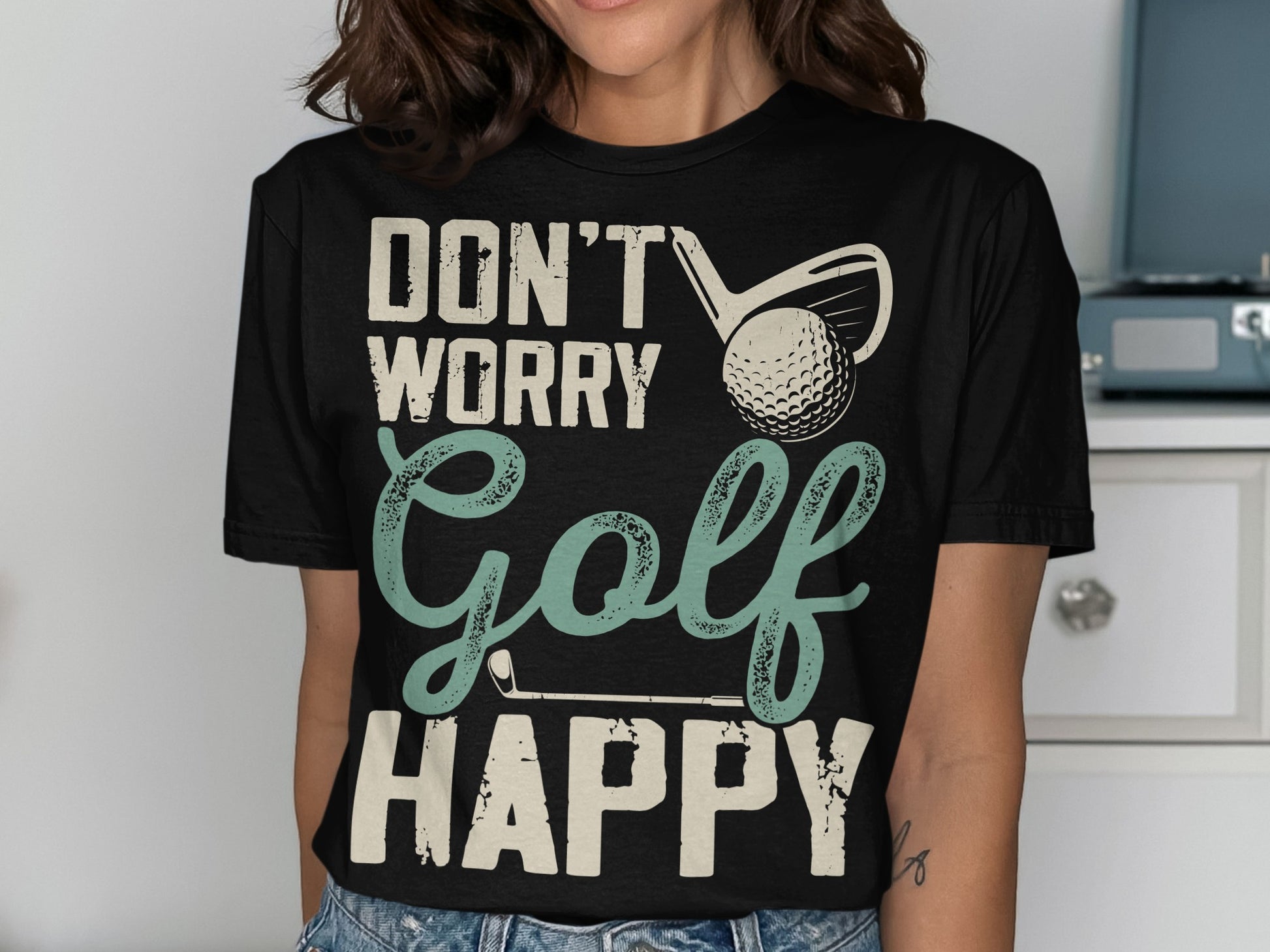 Black t-shirt with "DON'T WORRY Golf HAPPY" and golf club graphic.