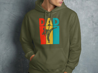 Green hoodie with "DAD" in retro colors and a silhouette of a martial artist.