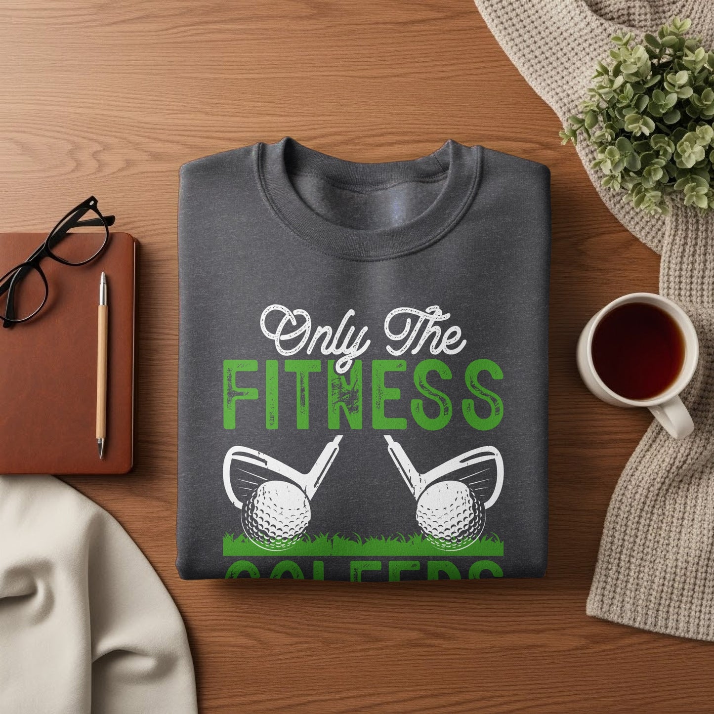 Dark gray sweatshirt with "Only The Fitness Golfers" text and golf club graphic.