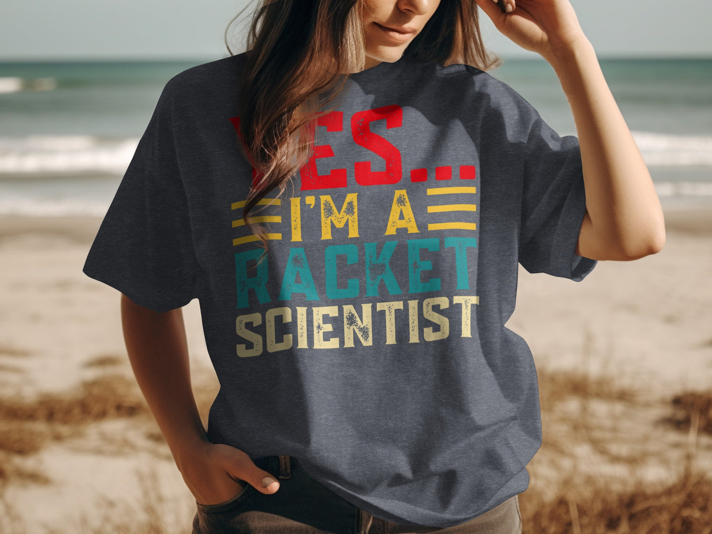 Dark t-shirt with "YES. I'M A RACKET SCIENTIST" text.