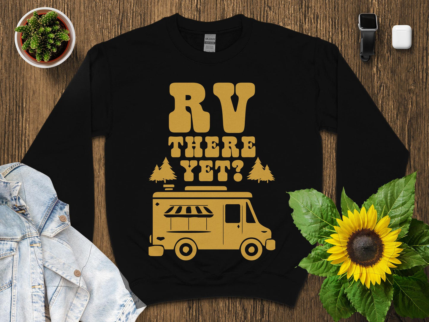 Black sweatshirt with "RV THERE YET?" and a graphic of an RV.