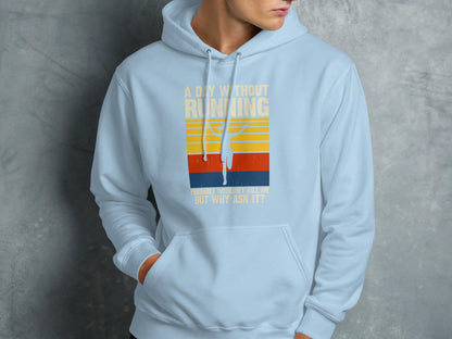 Light blue hoodie with striped graphic and "A day without running" text.