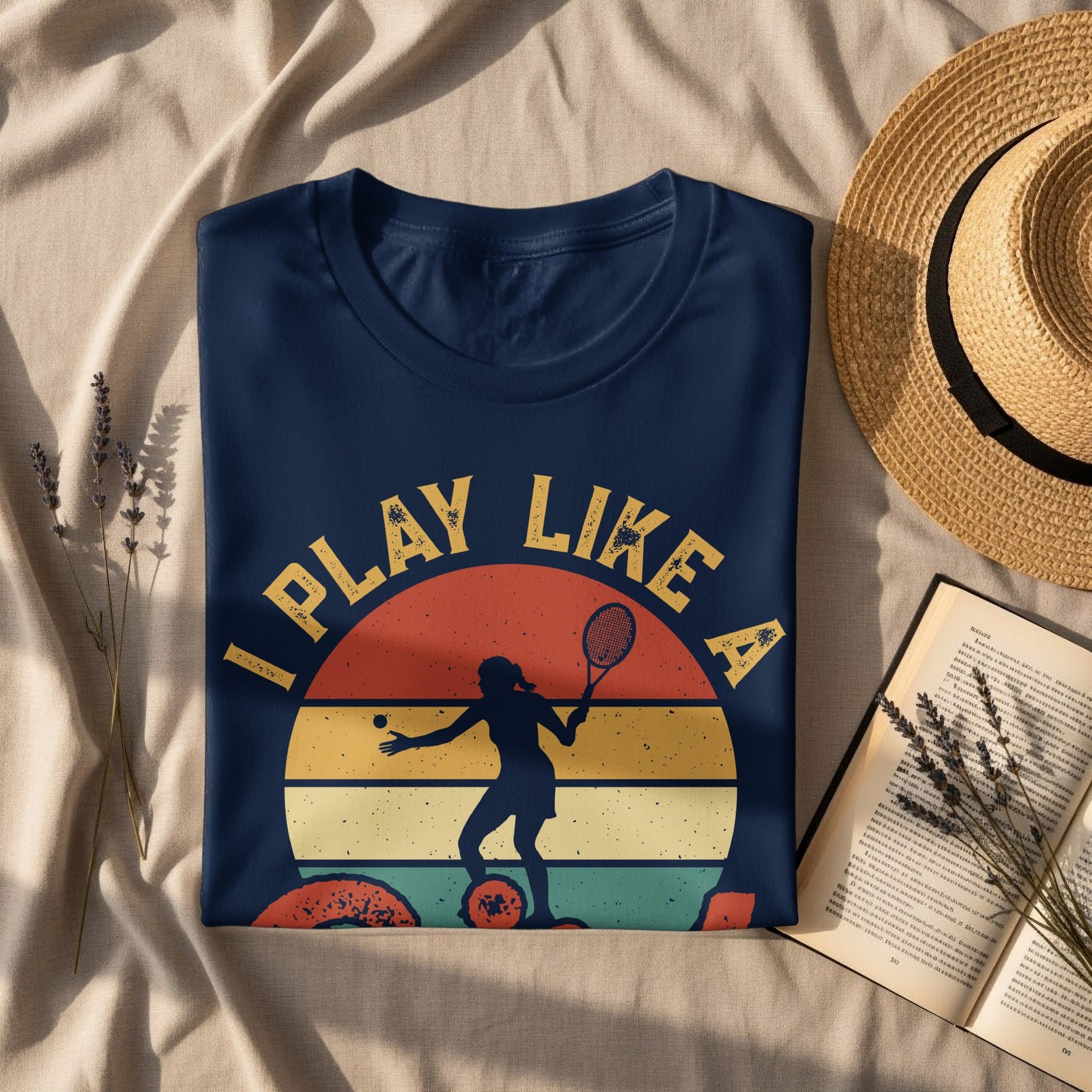 Navy t-shirt with "I PLAY LIKE A" text and tennis player graphic.